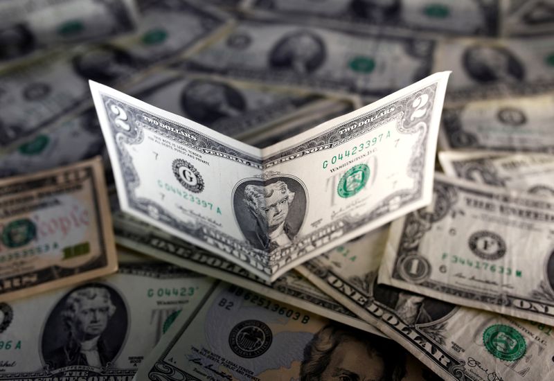 Dollar heads for weekly gain as new infections sap confidence